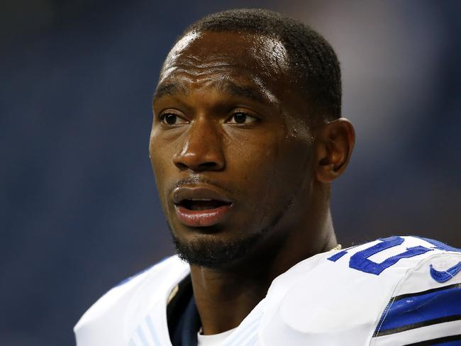 FILE - This is an Oct. 27, 2013, file photo showing Dallas Cowboys running back Joseph Randle watching during warmups before an NFL football game against the Detroit Lions in Detroit. Police in suburban Dallas say Randle has been arrested after taking underwear and cologne from a mall department store without paying. Frisco Police Sgt. Brad Merritt says Randle is charged with Class B misdemeanor theft. He was detained Monday evening, Oct. 13, 2014, by store security before being arrested and booked into the Frisco city jail. Merritt says Randle posted bond early Tuesday. (AP Photo/Paul Sancya, File)