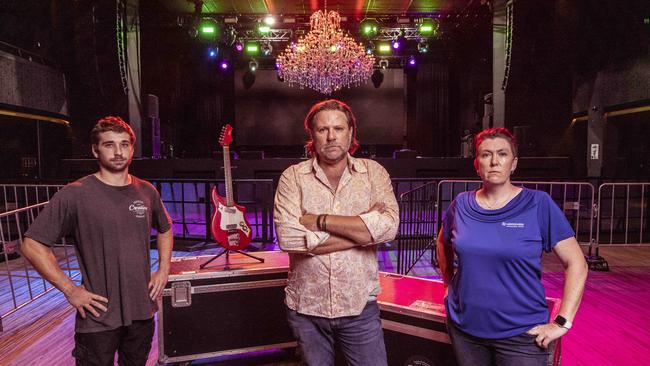 Venue co-owner John Collins, centre, with music industry workers Jordan Jackson and Shannon Ward at The Fortitude Music Hall in Brisbane. Picture: Glenn Hunt