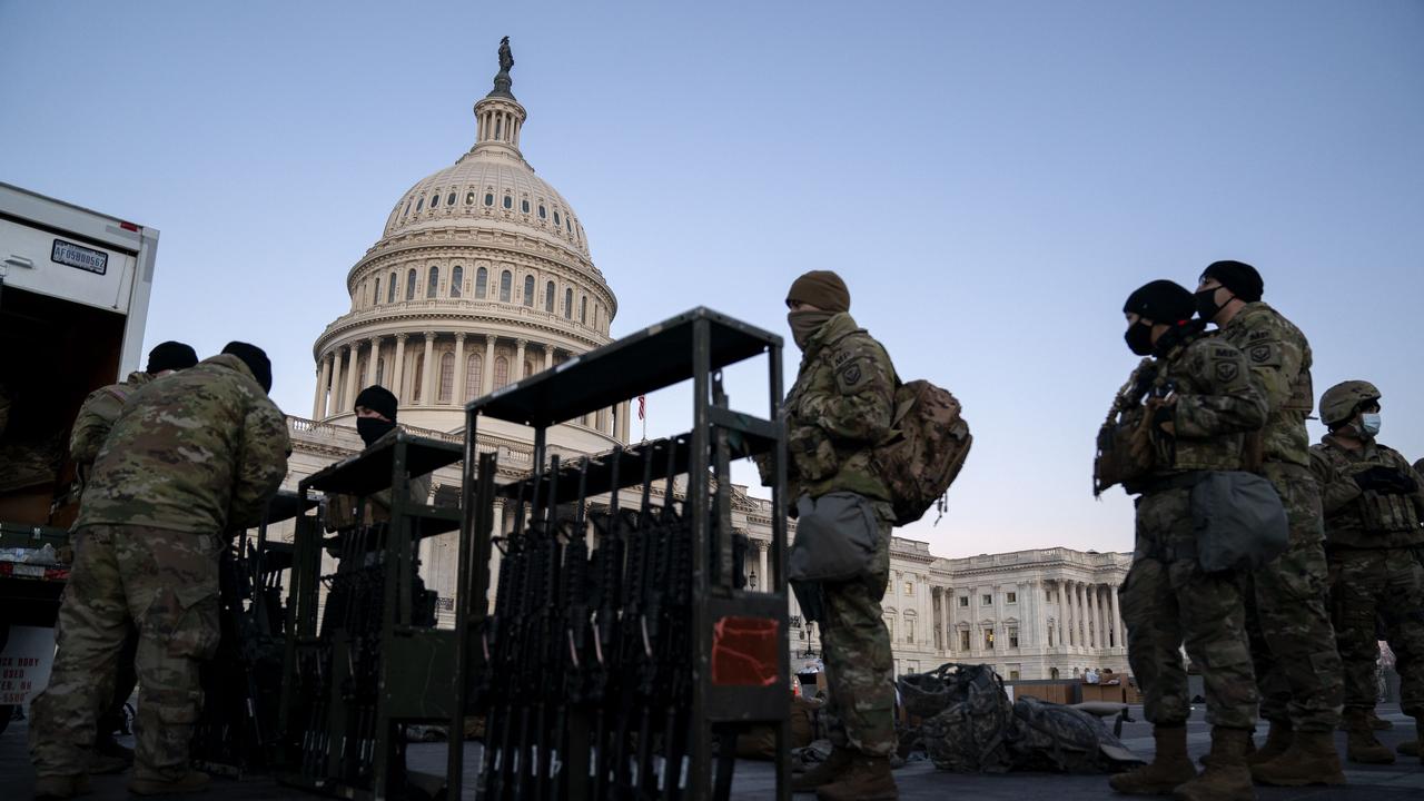 Weapons are distributed to members of the National Guard outside the US Capitol on January 13. Picture: AFP