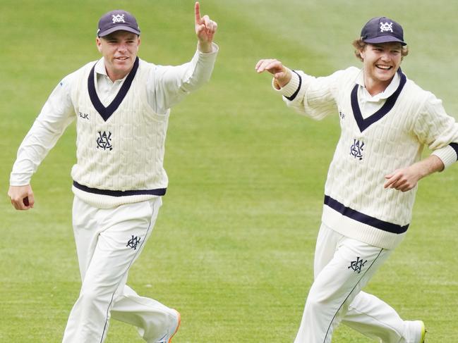 Marcus Harris of Victoria celebrates a catch with Will Pucovski (Right) during day 2 of the Sheffield Shield match between Victoria and New South Wales at the Melbourne Cricket Ground in Melbourne, Friday, November 29, 2019. (AAP Image/Michael Dodge) NO ARCHIVING, EDITORIAL USE ONLY, IMAGES TO BE USED FOR NEWS REPORTING PURPOSES ONLY, NO COMMERCIAL USE WHATSOEVER, NO USE IN BOOKS WITHOUT PRIOR WRITTEN CONSENT FROM AAP