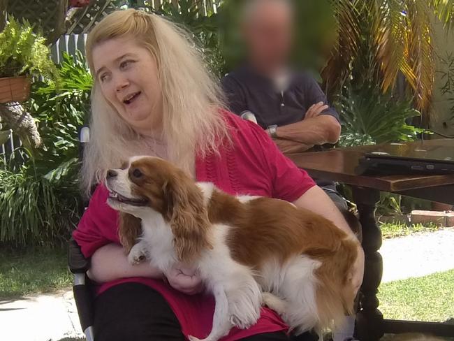 Ann Marie Smith  happy at a social occasion in 2011 , with her dogs Maggie( Collie ) and Deana . Picture: SAPOL