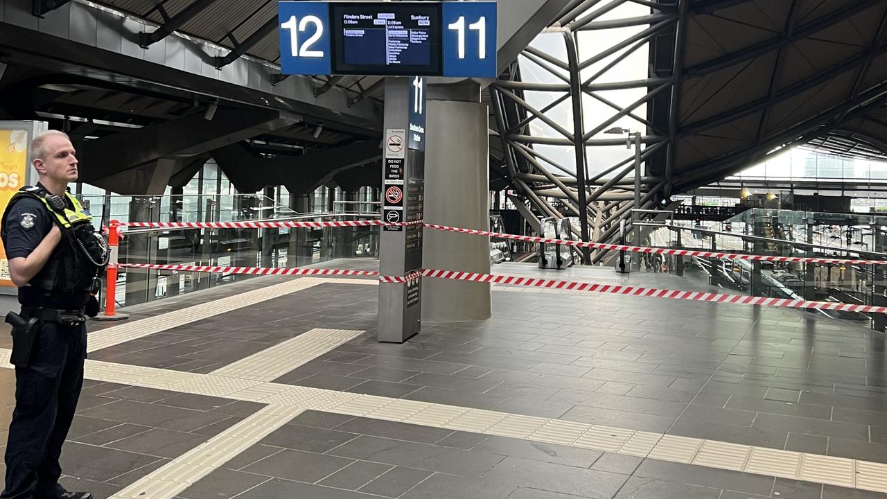 Police at the scene at Southern Cross Station. Picture: Fergus Ellis