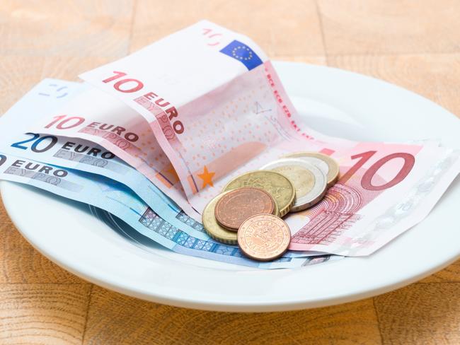 Restaurant payment comprising of Euro banknotes and coins. Picture: iStock.