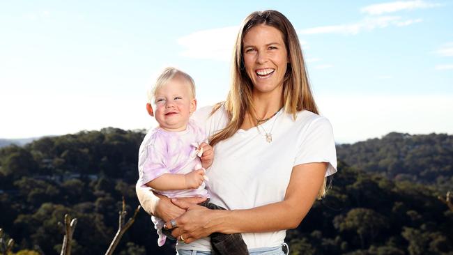 Snowboarder Torah Bright with her now 10-month-old baby, Flow. Picture: Tim Hunter