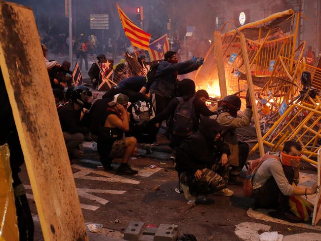 Spain's protest-hit northeast was gripped by a general strike today as thousands of "freedom marchers" converged on Barcelona for a mass show of dissent. Picture: AFP