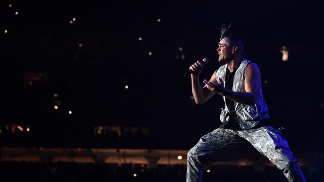 Mitch Tambo thrilled thousands with his Indigenous language lyrics for You’re The Voice at the Fire Fight Australia bushfire relief concert. Picture: AAP Image/Joel Carrett.