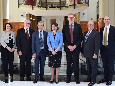 Supplied Editorial ICAC commissioners and staff with Gladys Berejiklian