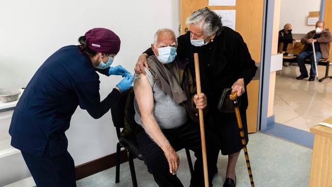 A healthcare worker administers a dose of vaccine to a man in the Cypriot coastal city of Limassol. Picture: AFP