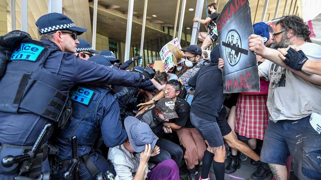 Climate change protesters blockade the mining conference at the Melbourne Exhibition Centre. Picture: Jake Nowakowski