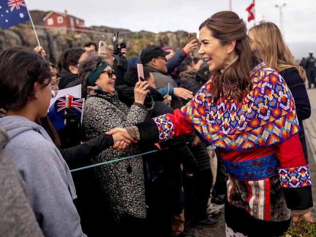 Denmark's Queen Mary meets with local residents upon arriving in Sisimiut, Greenland, earlier in July. Picture: AFP