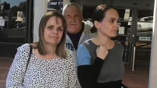 Kimberley Treacy (right) leaves Campbelltown Court House with her mother and father.