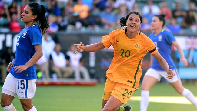 Sam Kerr #20 of Australia celebrates her goal.