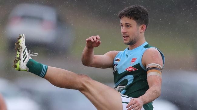 Geelong Amateur's Tom Gribble kicks for goal. Picture: Alan Barber