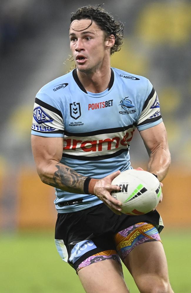 Nicho Hynes of the Sharks runs the ball during the round 25 NRL match between North Queensland Cowboys and Cronulla Sharks at Qld Country Bank Stadium on August 17, 2023 in Townsville, Australia. (Photo by Ian Hitchcock/Getty Images)