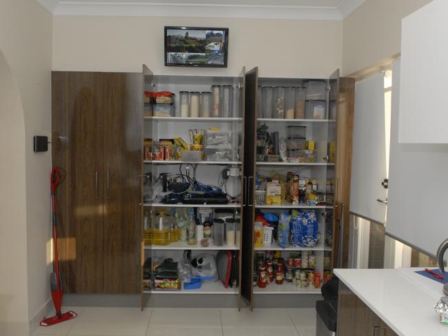 Police searched every part of the property, including the couple’s neatly stacked pantry.