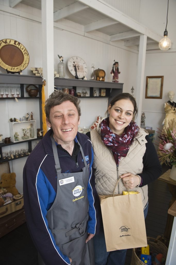 YellowBridge Queensland client Mikey Jones chats with Katie Storey in Collectables, Tuesday, June 7, 2016. Picture: Kevin Farmer