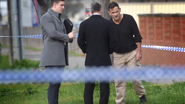 Nik Jovanovic speaks to police after the terrifying incident. Picture: Tony Gough