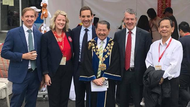 Chap Chow, above, far right, with Housing Minister Clare O’Neil, second from left, and Attorney-General Mark Dreyfus, second from right.