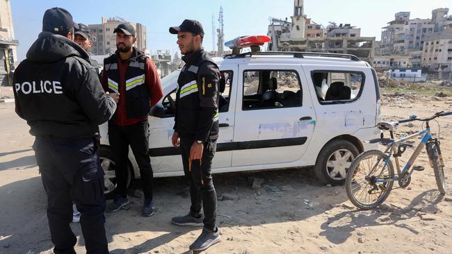 Members of security forces loyal to Hamas stand guard in Gaza City on Tuesday, on the third day of a ceasefire deal in the war between Israel and Hamas in the Palestinian territory. Picture: AFP