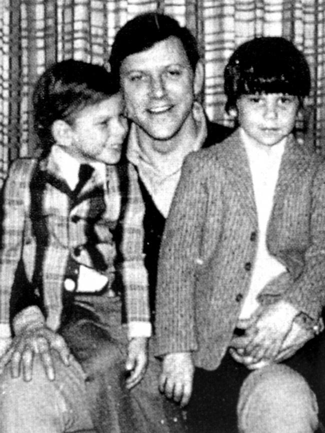 An undated photo of Erik &amp; Lyle Menendez sitting on the knee of father Jose.