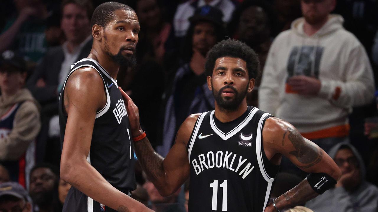 NEW YORK, NEW YORK - APRIL 23: Kevin Durant #7 and Kyrie Irving #11 of the Brooklyn Nets look on in the final seconds of their 109-103 loss against the Boston Celtics during Game Three of the Eastern Conference First Round NBA Playoffs at Barclays Center on April 23, 2022 in New York City. NOTE TO USER: User expressly acknowledges and agrees that, by downloading and or using this photograph, User is consenting to the terms and conditions of the Getty Images License Agreement. Al Bello/Getty Images/AFP. == FOR NEWSPAPERS, INTERNET, TELCOS &amp; TELEVISION USE ONLY ==