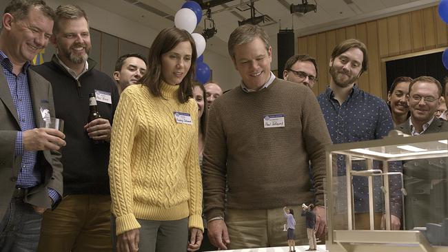 Kristen Wiig, centre left, and Matt Damon, centre right, in a scene from "Downsizing."