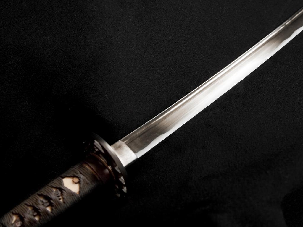 A selectively lit samurai sword on a black background. Picture: iStock