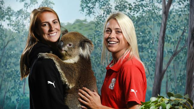 Abby Dahlkemper, right, with ex-teammate Sarah Killion, at Cleland Wildlife Park during her Adelaide United stint in 2015. Picture: Roger Wyman