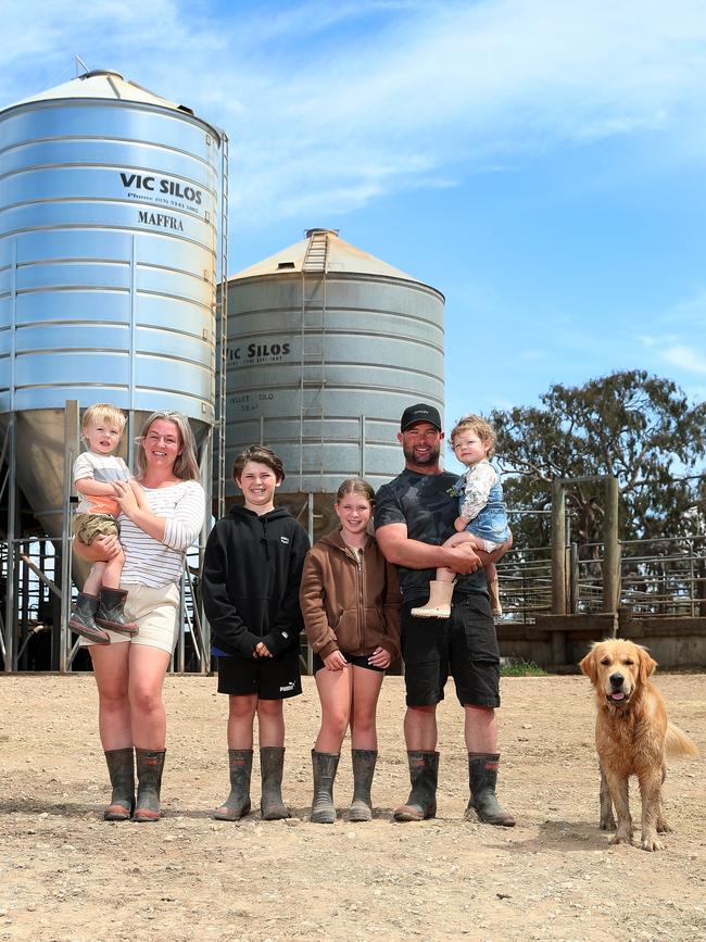 Farmer of the Year 2022 winners Nicole and Brendan Saunders with their children. Picture: Yuri Kouzmin