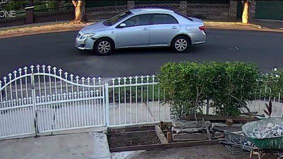 Police are searching for the driver of this car, describe as a white or silver Corolla. 