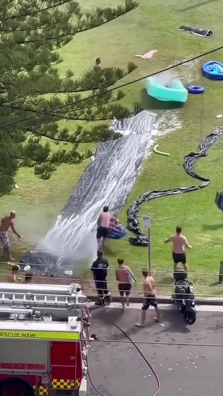 Firefighters help out with Australia Day slip 'n' slide