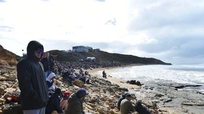 Spectators look on during the 2019 Rip Curl Pro at Bells Beach. Picture: AAP Image/James Ross