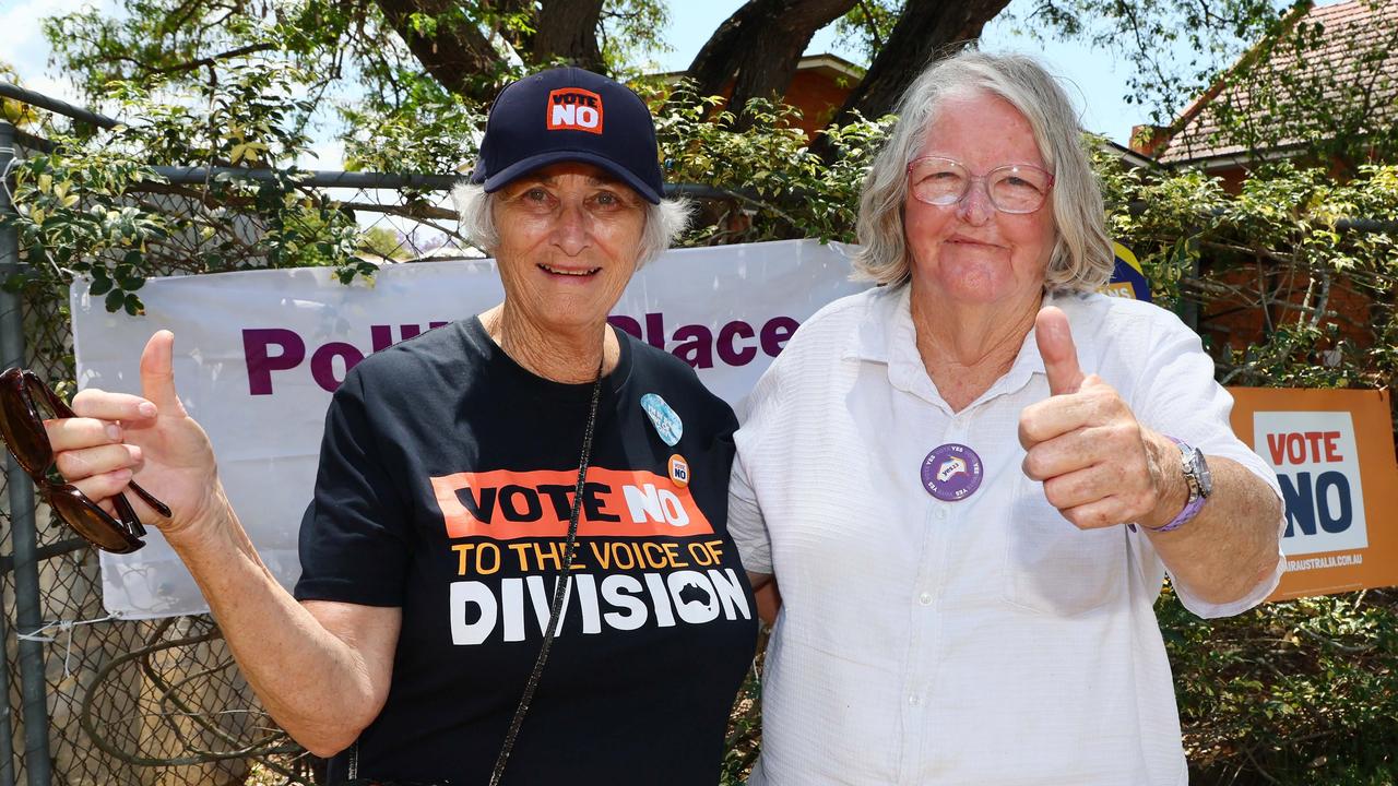 NO andYES volunteers Jeanette Glasgow, left, and Carol Nevin, right, at the Glebe Road Kindy where voting in the Referendum on The Voice in QLD took place. Picture: Tertius Pickard