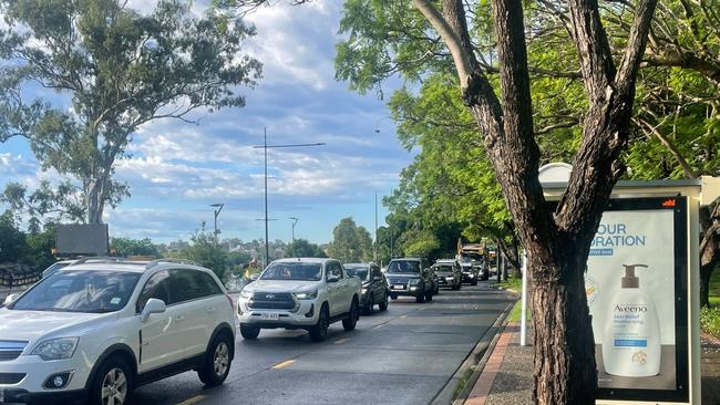 Traffic builds on Coronation Drive at Auchenflower on Thursday morning after a sink hole formed. Picture: Andreas Nicola