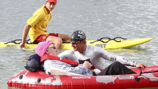 Kevin Ferguson and quadriplegic Sid James competing in the Victor Harbor triathlon.