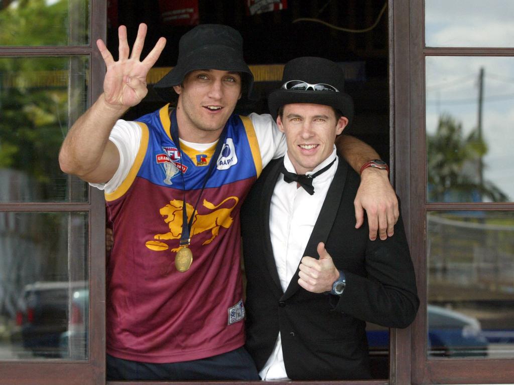 McRae, pictured with former Lions teammate Daniel Bradshaw in 2003, was king of mad Monday during his days in Brisbane.