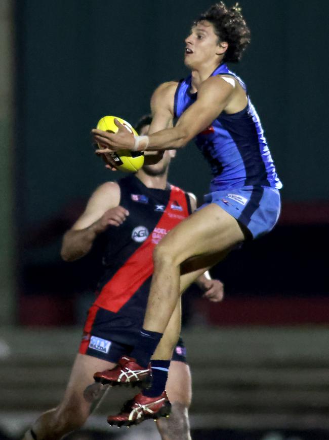 Sturt’s James Borlase marks against West Adelaide. Picture: Kelly Barnes