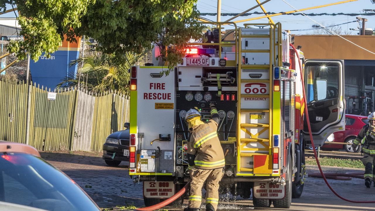 Crews on the scene of the Battery World fire. Picture: Nev Madsen.