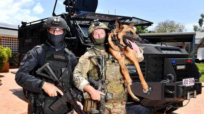 Queensland Police Service Open Day at the Queensland Police Academy North Queensland Campus. SERT operators with a Tactical Work Dog and Police BeartCat. Picture: Evan Morgan