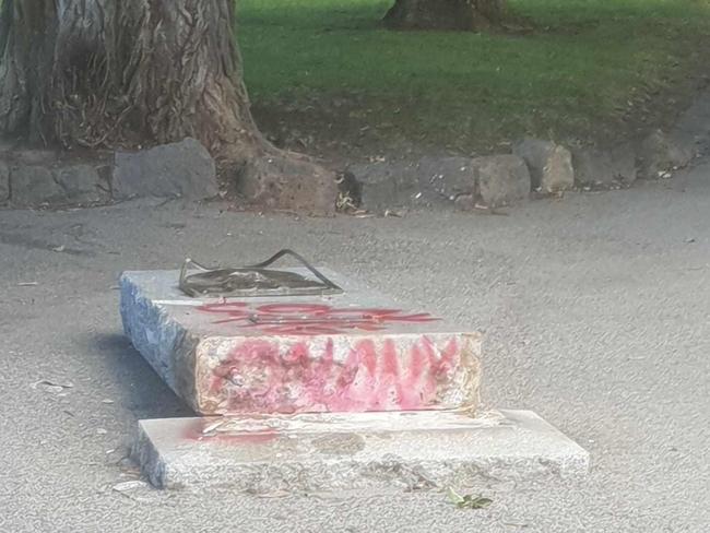 A Captain Cook statue has been sawn off and defaced at Edinburgh Gardens, Fitzroy North.