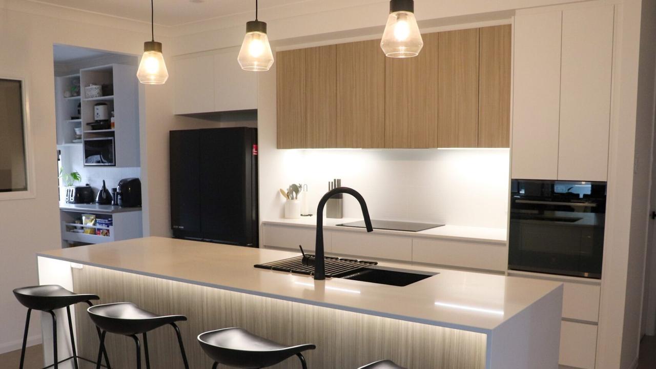 Gusmeroli-family owned Moduline, which has sales offices in Cairns, Ingham and Townsville, has been operating since 1965 and manufactures and custom installs kitchens, bathrooms, laundries, entertainment areas, wardrobes and commercial spaces. Picture: Moduline