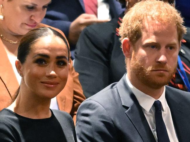 Prince Harry (R) and Meghan Markle (L), the Duke and Duchess of Sussex, attend the 2020 UN Nelson Mandela Prize award ceremony at the United Nations in New York on July 18, 2022. - The Prize is being awarded to Marianna Vardinoyannis of Greece and Doctor Morissanda Kouyate of Guinea. (Photo by TIMOTHY A. CLARY / AFP)