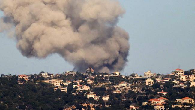 Smoke rises over the southern Lebanese border village of Sujud during an Israeli strike on October 26, 2024, amid the ongoing war between Israel and Hezbollah. (Photo by AFP)