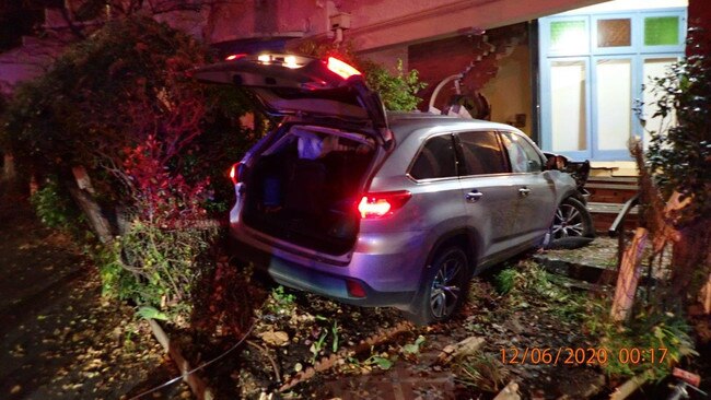 A Toyota Kluger ploughed into a North Melbourne home.
