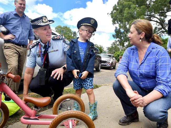 Queensland Police Commissioner Katarina Carroll and Premier Annastacia Palaszczuk spoke with four-year-old Beckham Waghorn in Jindalee following the horror floods. Picture: NCA NewsWire/John Gass