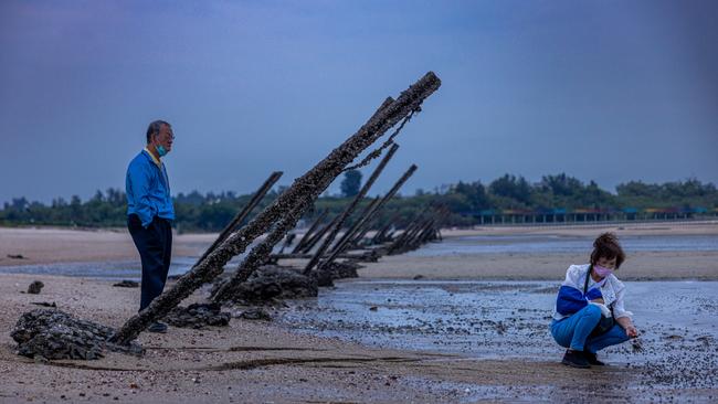 Tourists visit the Ci Lake, a large lake next to the sea facing Xiamen, built by the military for strategic purposes in 1969 in Kinmen, Taiwan.