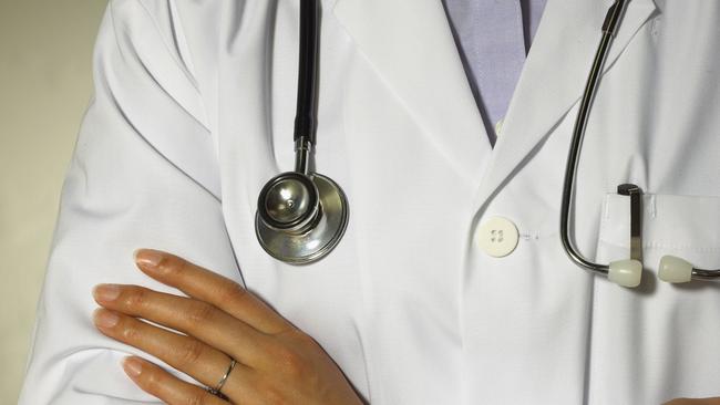 Generic image of female doctor with crossed arms and a stethoscope.