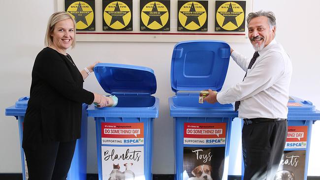 Suzanne Squires posing with Daniel Imbert at the donation bins at Revesby Workers Club in Revesby NSW, Australia. 5 July, 2018. Joyce is turning 100 and the home is having a party for her. (AAP IMAGE / Carmela Roche).