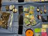 Named: Man charged after cops seize firearms, $55k cash, drugs