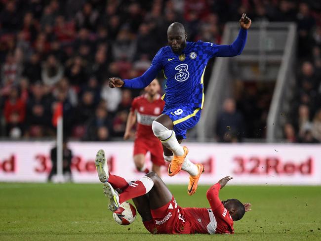 Bamba competing against Chelsea striker Romelu Lukaku in the FA Cup in 2022. (Photo by Oli SCARFF/AFP)